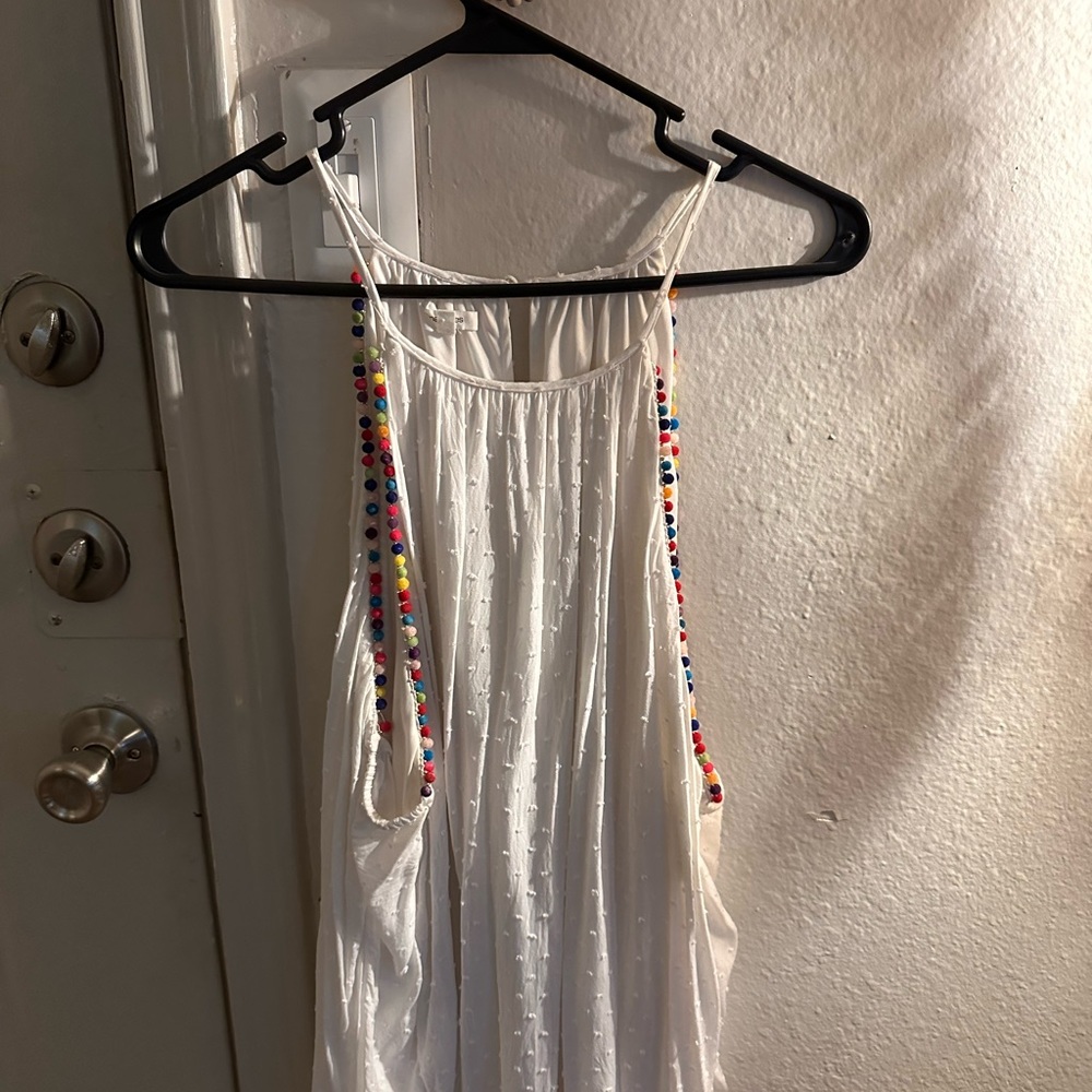 Decorated sleeveless top in perfect condition